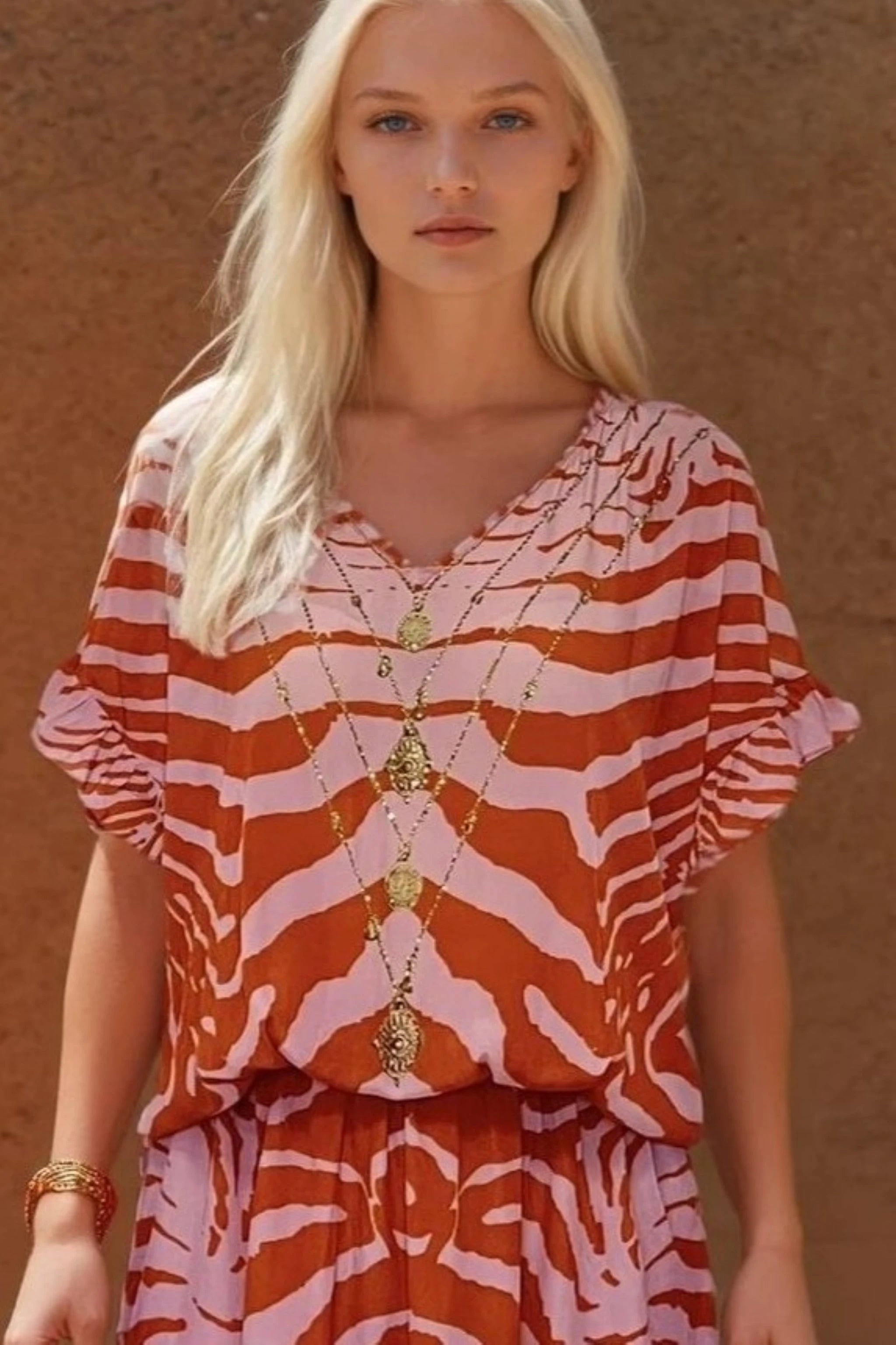 abstract tiger print short beach cover up by Lindsey Brown resort wear
