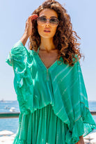 Aqua silk kaftan dress to wear over swimwear by Lindsey Brown bloused silk kaftans