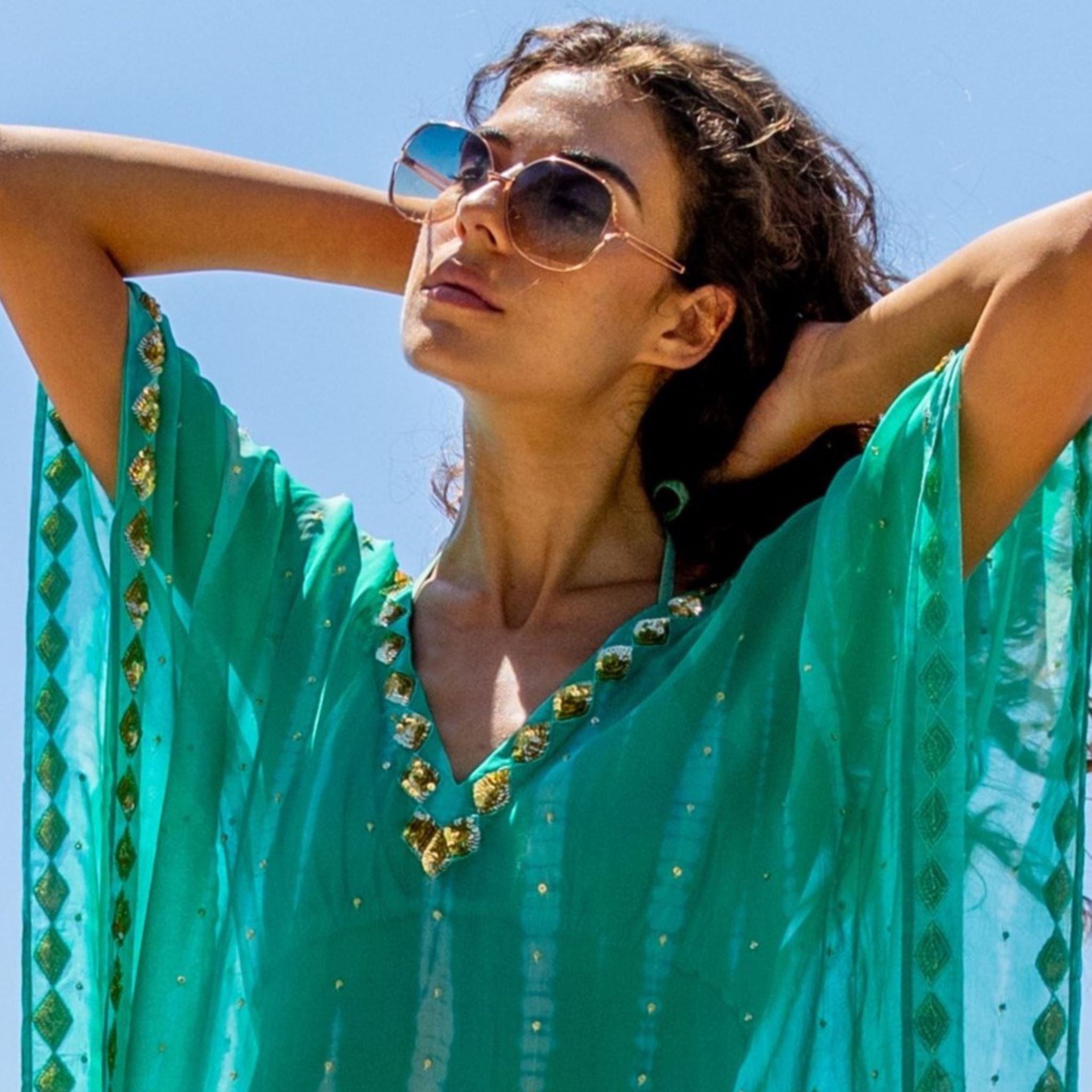 Aqua silk kaftans to wear in the Caribbean by lindsey brown silk resort wear