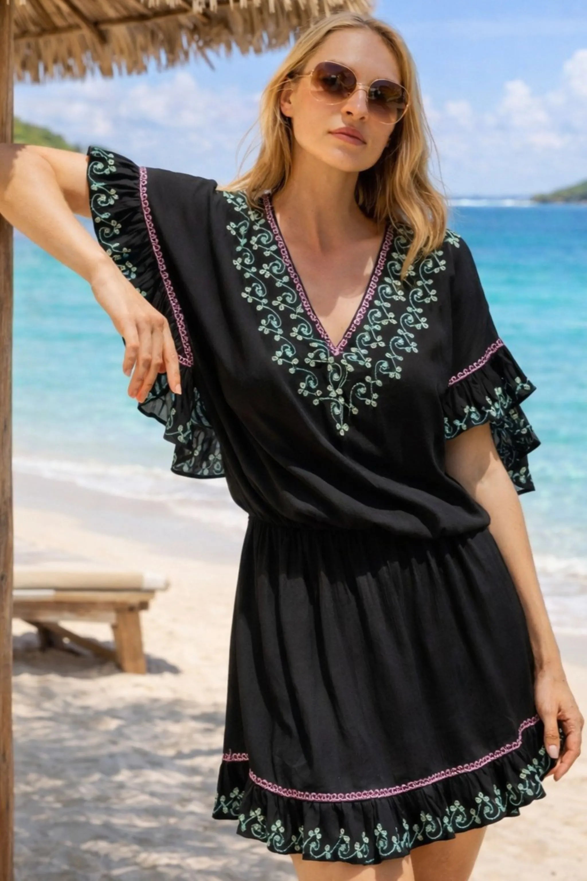 black cotton beach dress by lindsey brown to wear on a cruise holiday