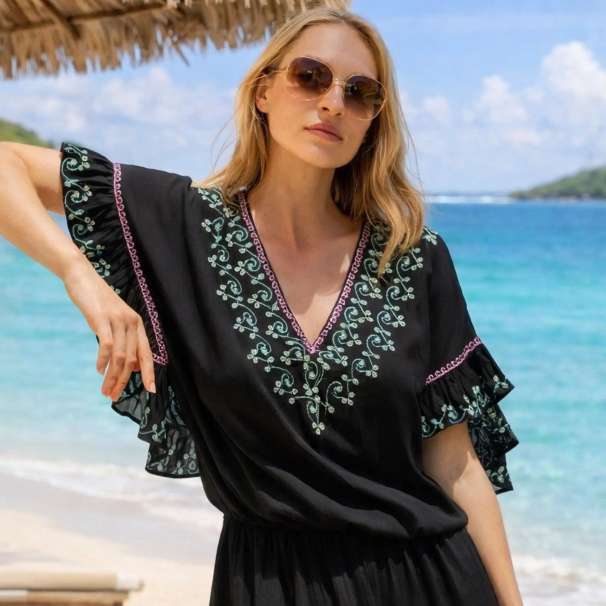 black cotton embroidered beach dresses to wear on holiday by lindsey brown resort wear 