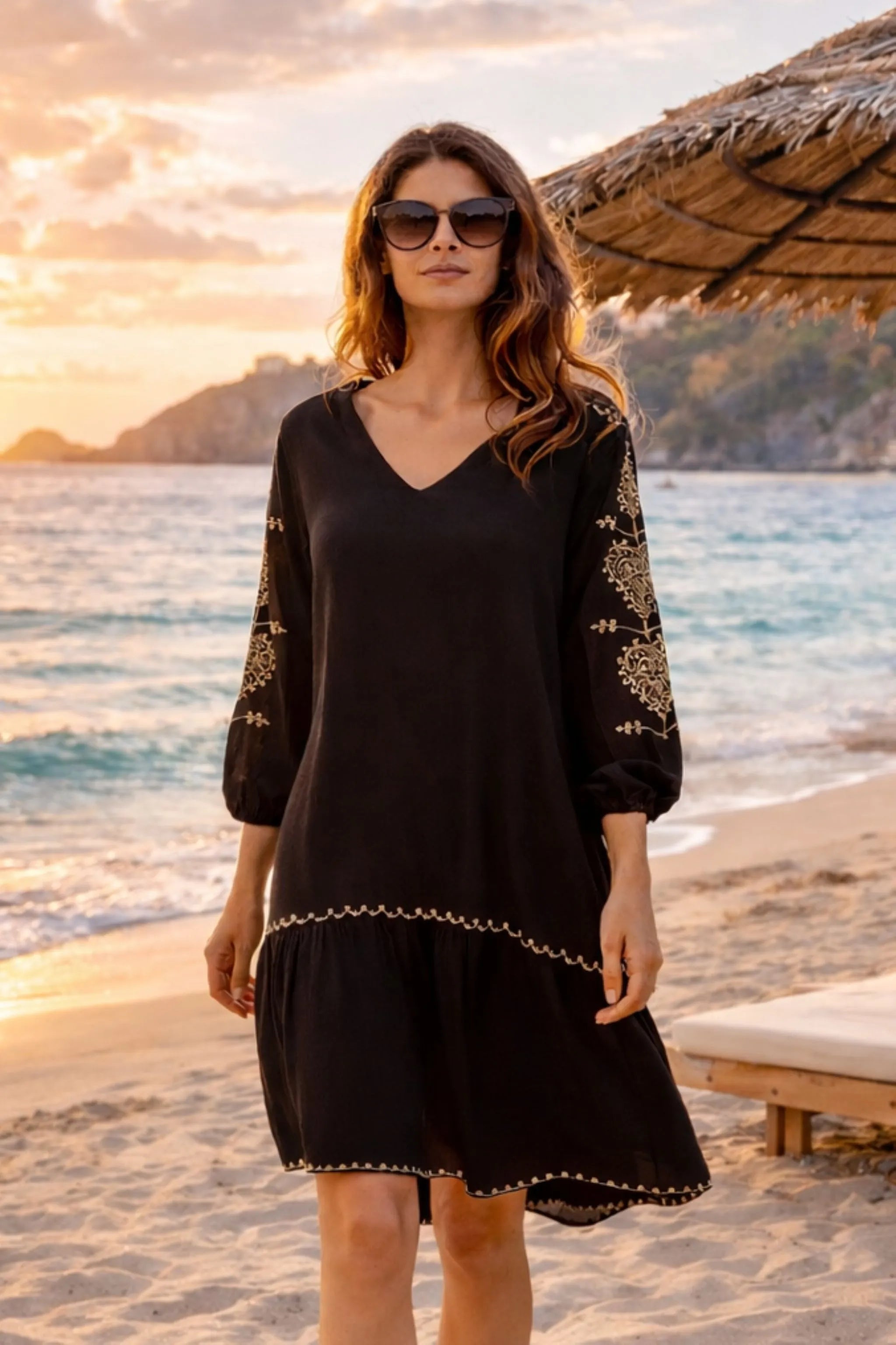 black cotton long sleeved loose fitting beach dress for warm summer holidays by lindsey brown
