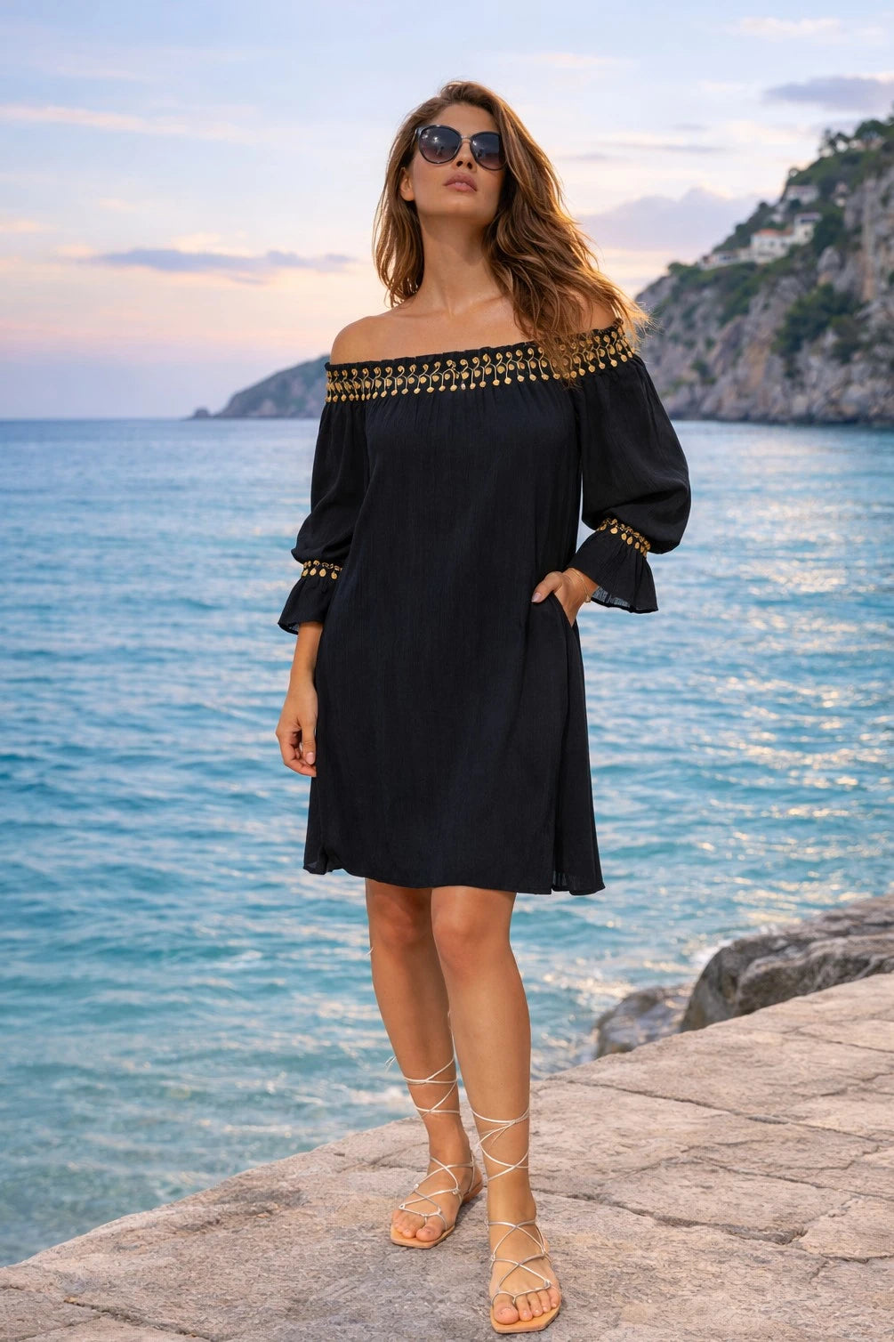 black and gold cotton long sleeved dress to wear on a cruise holiday