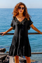 Black gold cotton beach dresses to wear on vacation by Lindsey Brown resort wear 