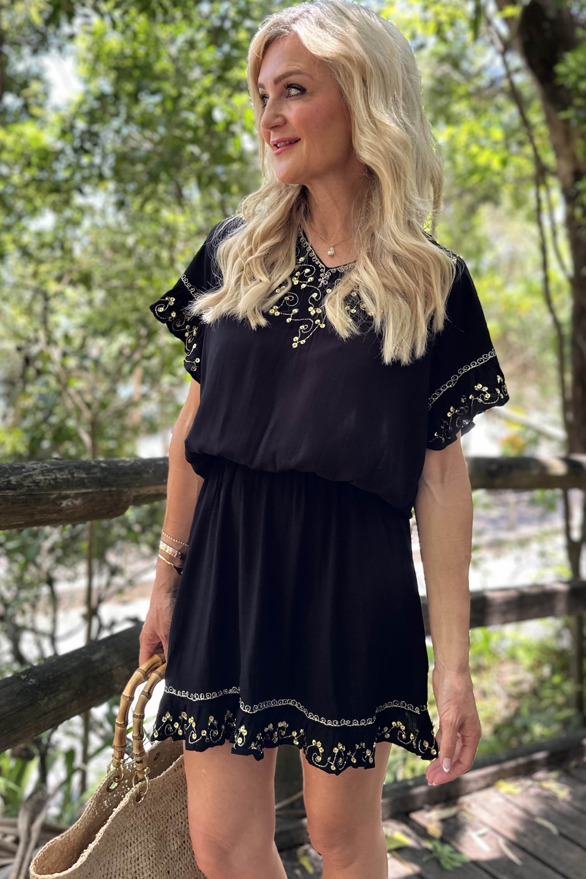 Black gold drop waisted beach dress to wear on a Cruise by Lindsey Brown resort wear 