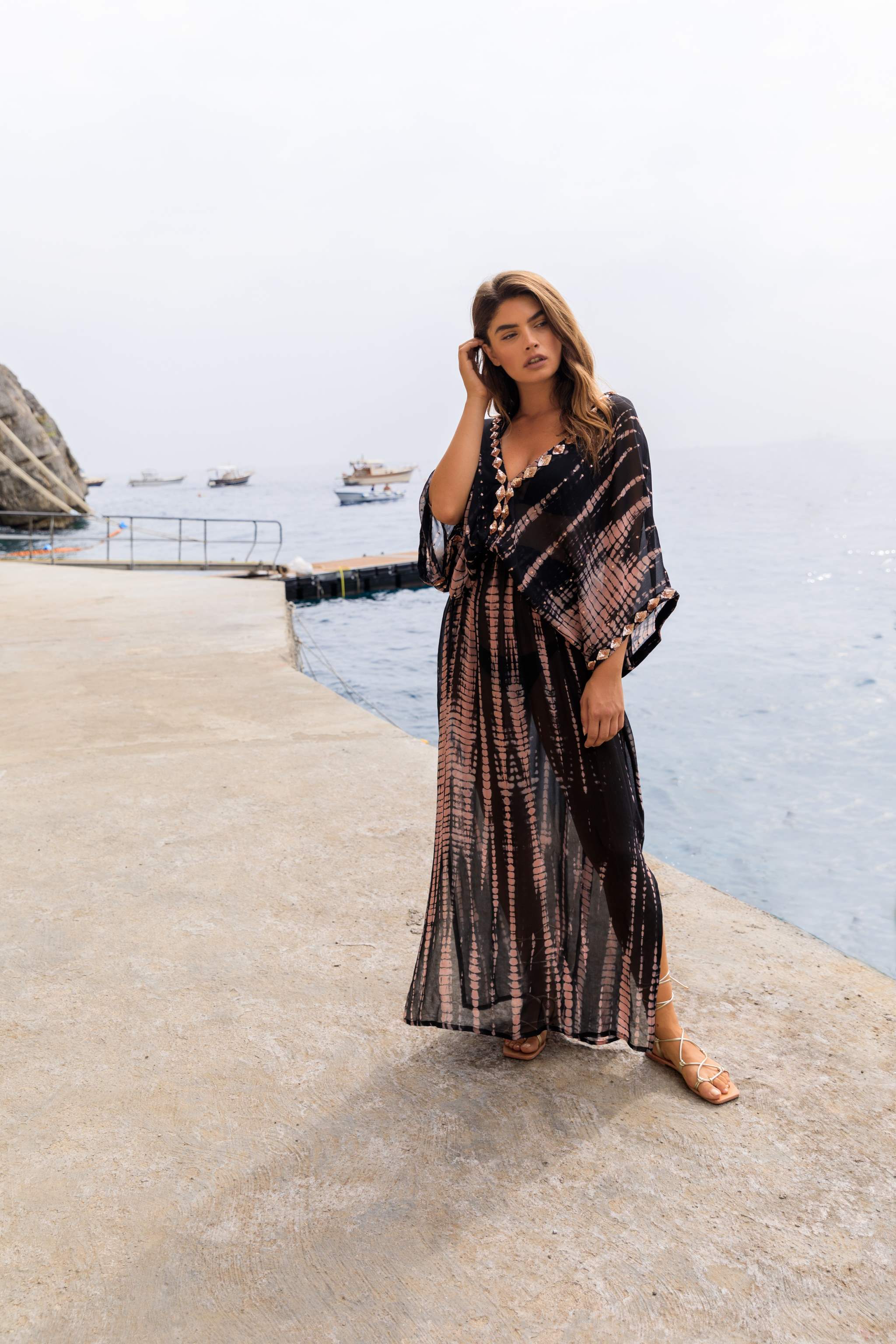 Black stunning silk kaftans to wear over swimwear on  luxury holiday by Lindsey Brown