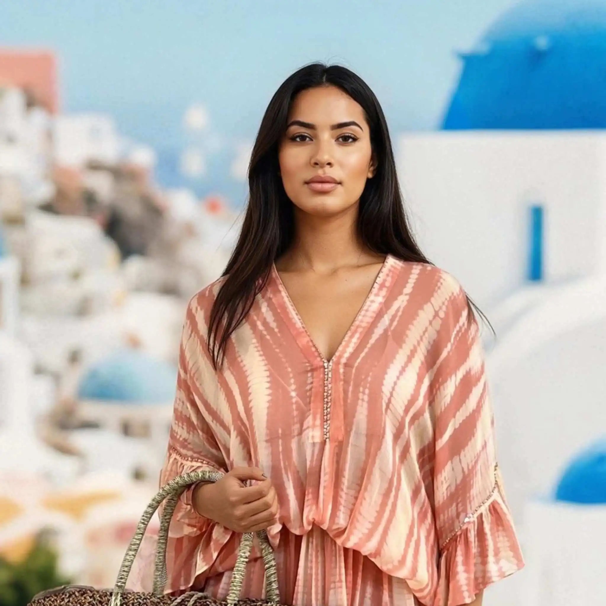 blush peach silk tie dye luxury kaftan dress by Lindsey Brown resort wear 