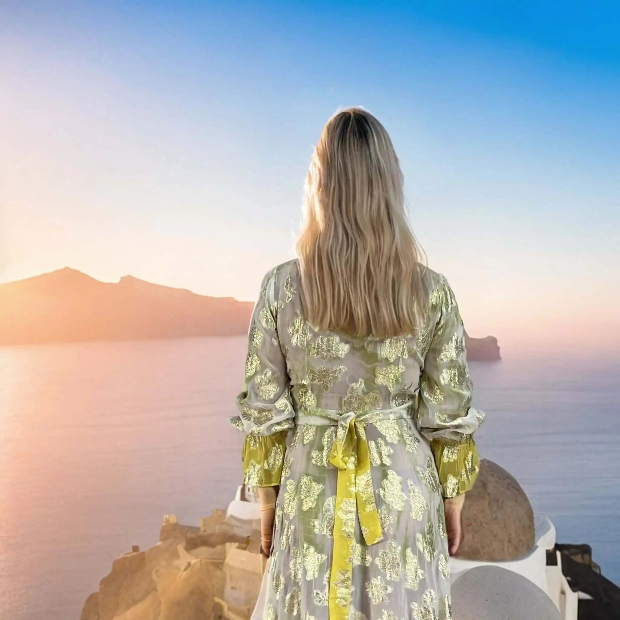 ivory yellow and gold wrap over maxi dress to wear on vacation by Lindsey Brown