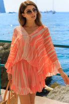 orange hand tie dye silk resort wear  kaftans to wear on vacation by Lindsey Brown