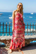 pink floaty maxi dresses to wear on vacation by Lindsey Brown resort wear 