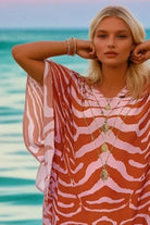  pink and orange tiger print floaty beach coverup by Lindsey Brown resort wear