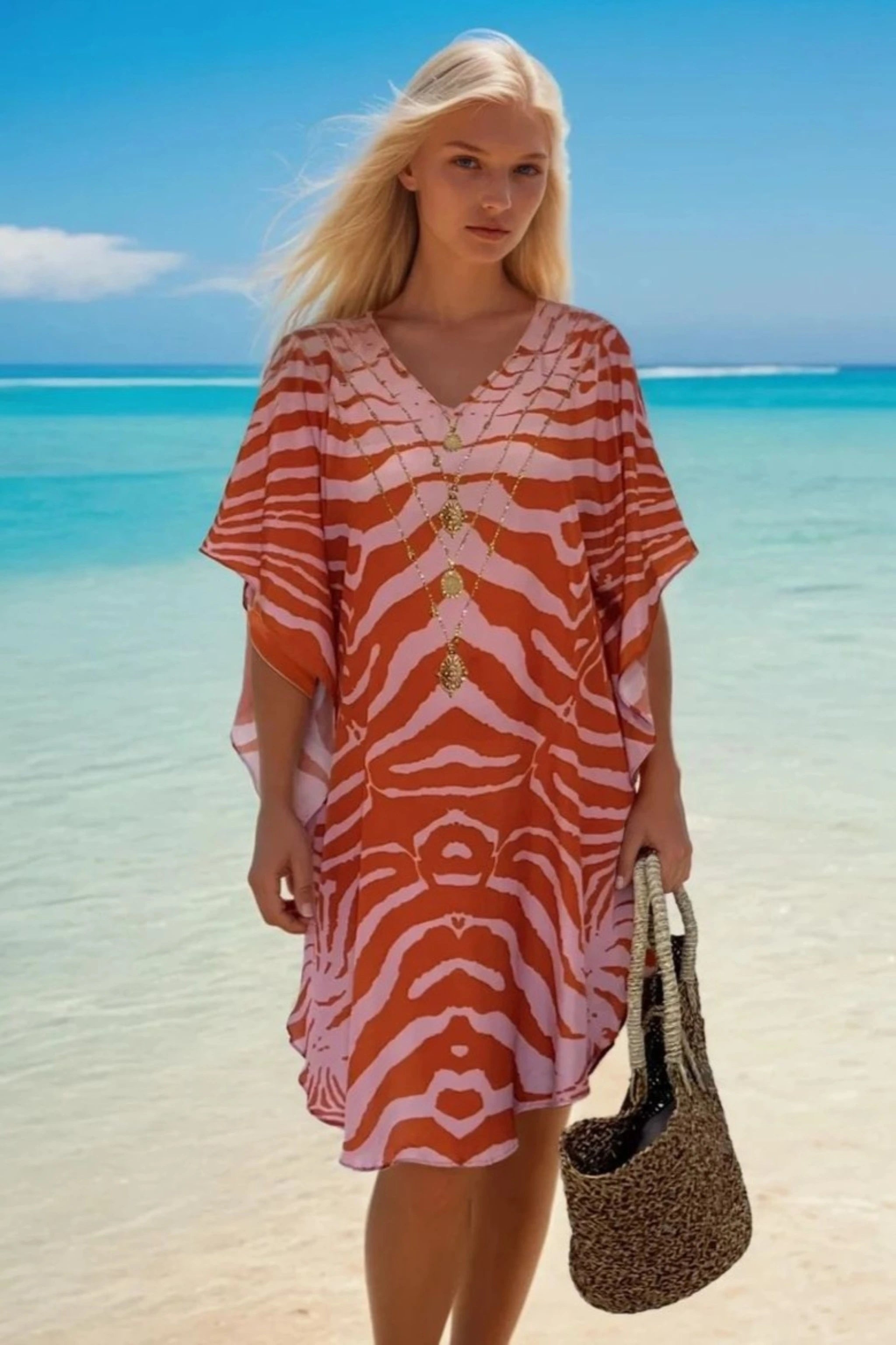 pink and orange tiger print floaty beach coverup by Lindsey Brown resort wear