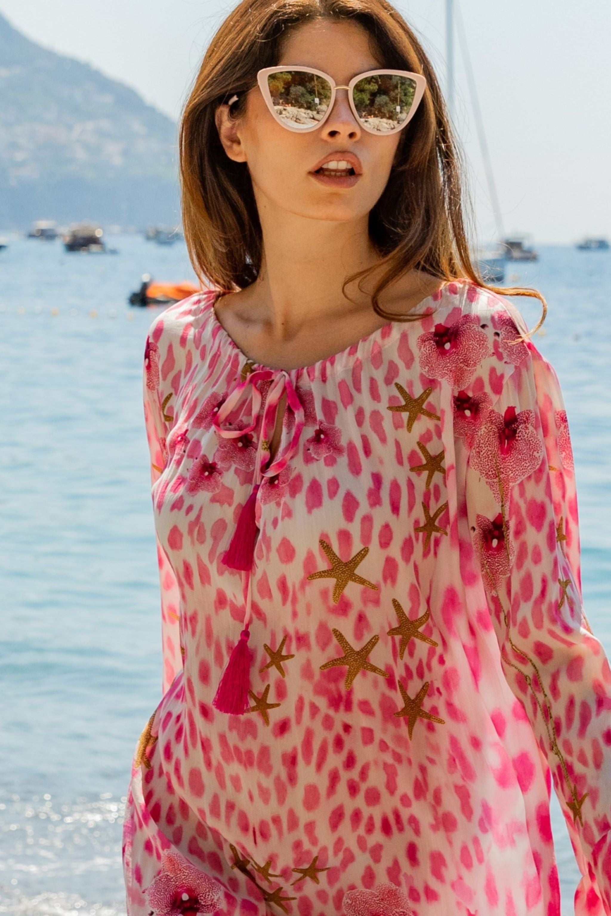 Pink silk animal print silk resort wear dress by Lindsey Brown luxury resort wear