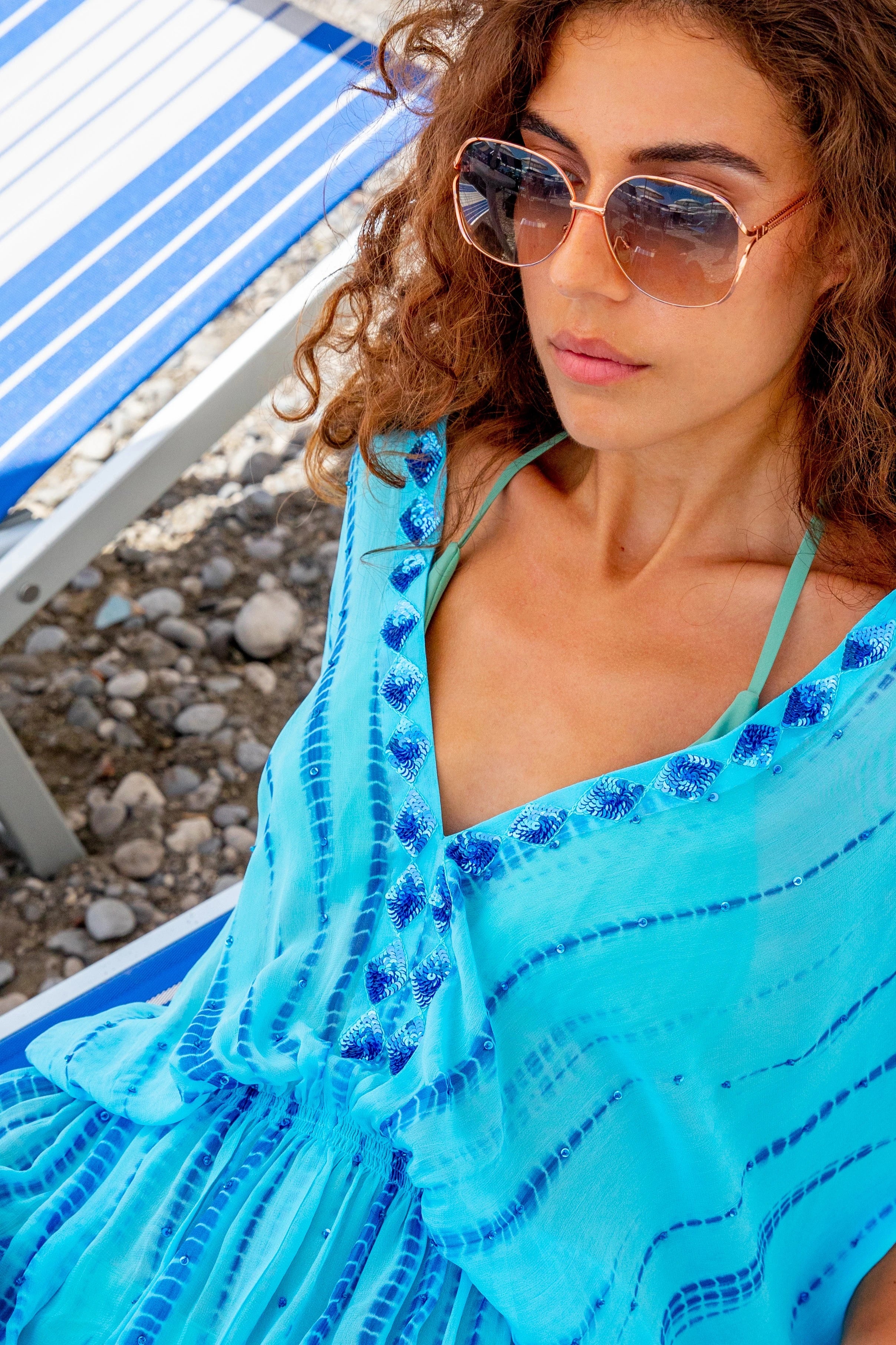 turquoise blue silk tie dye luxury resort wear kaftans by Lindsey Brown