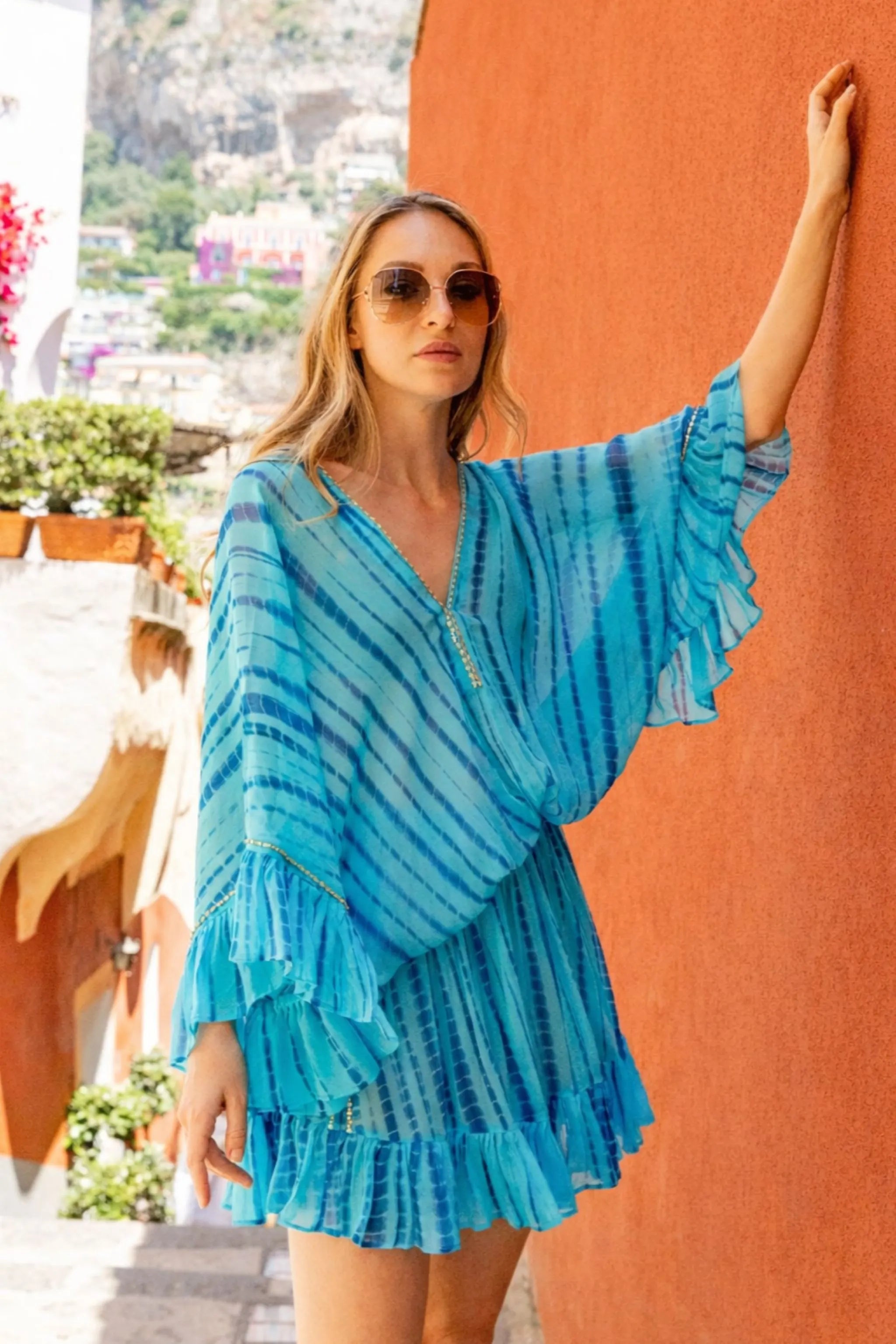 turquoise silk kaftan dresses to wear on holiday by Lindsey Brown resort wear