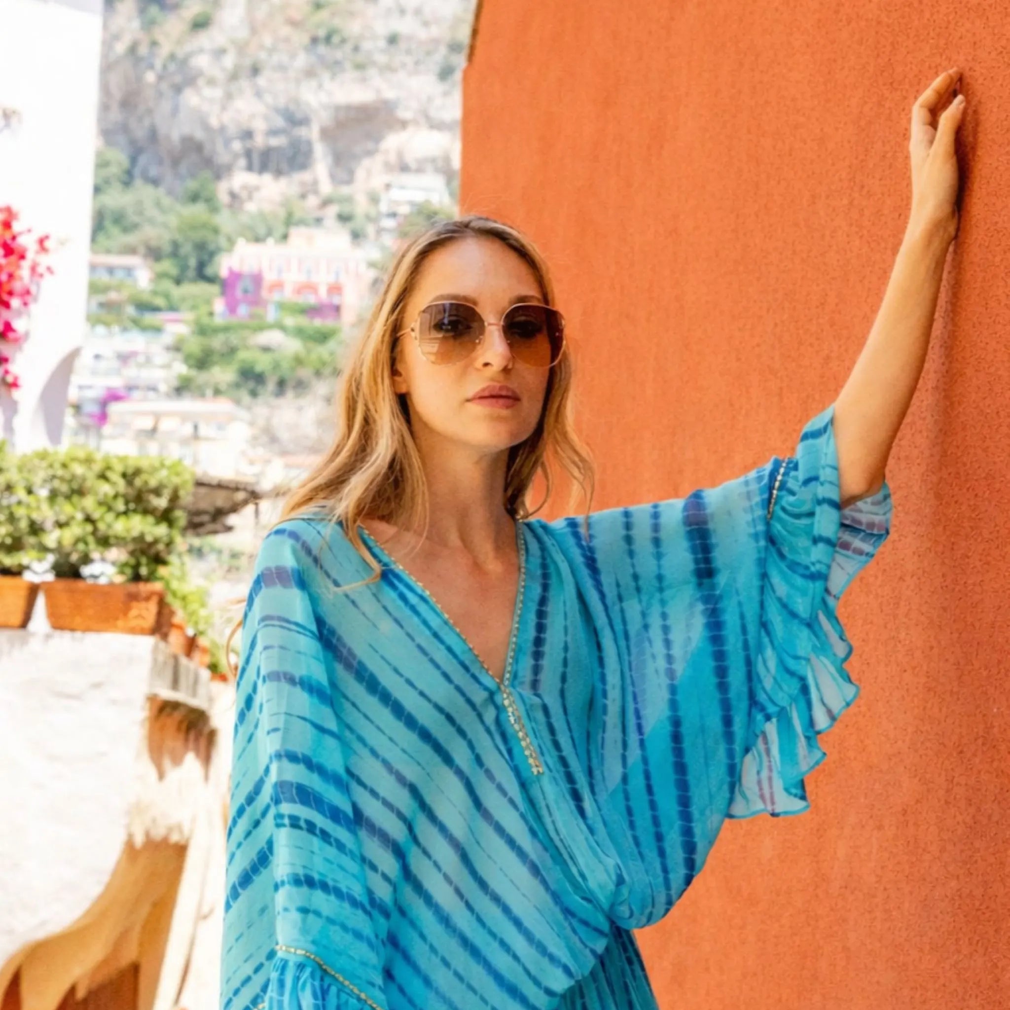 turquoise silk kaftan dresses to wear on holiday by Lindsey Brown resort wear