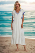 white cotton midi dress to wear on warm holidays by Lindsey Brown