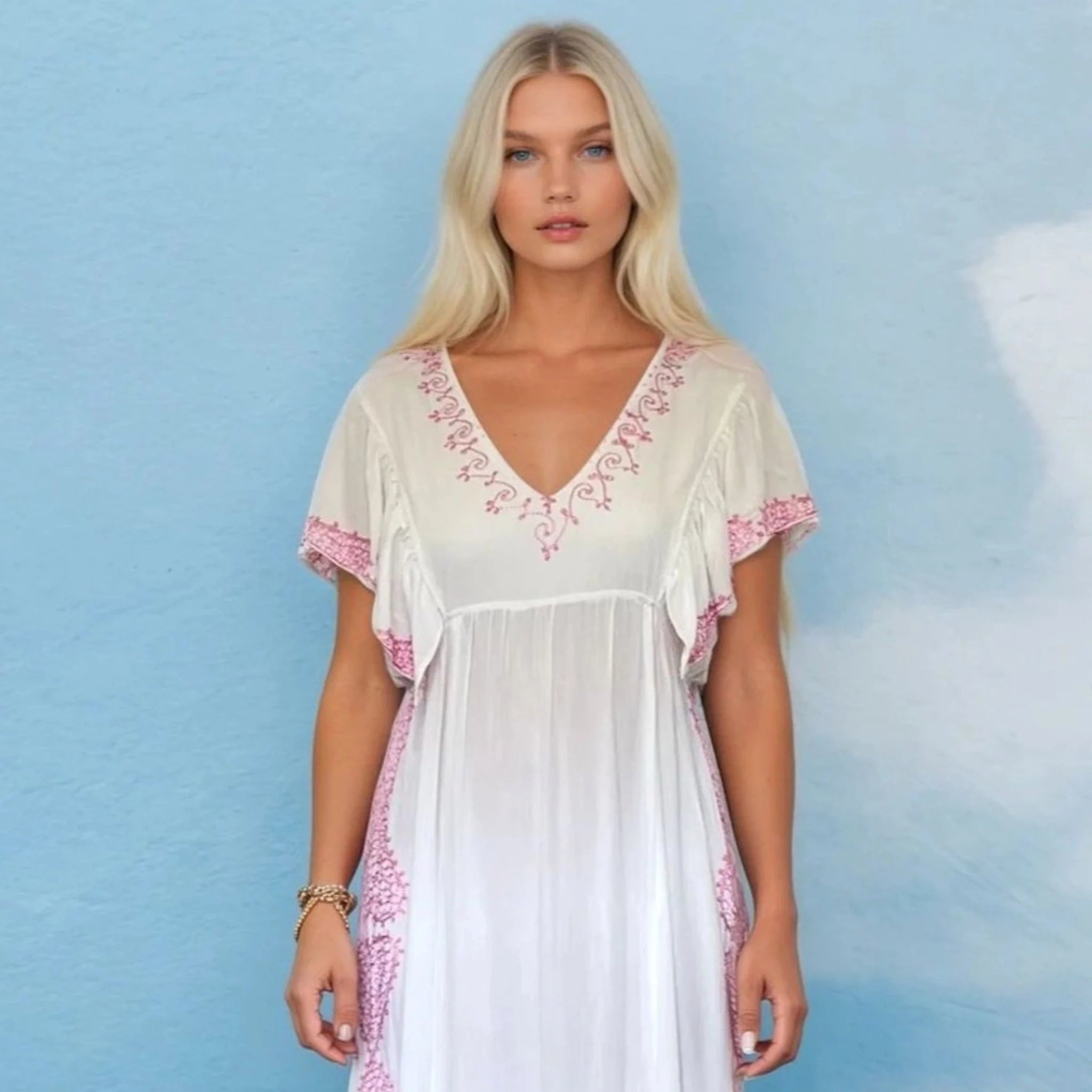 white pink cotton midi dress to wear on holiday by Lindsey Brown resort wear 