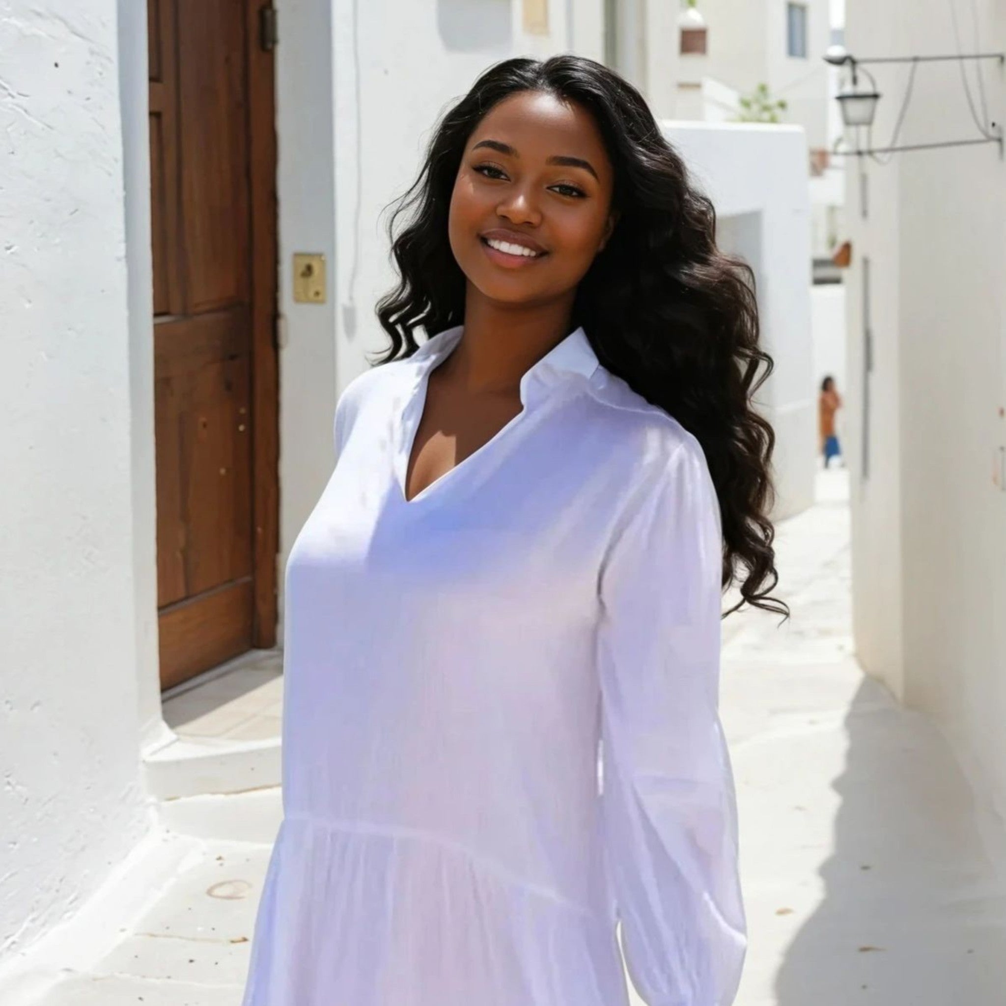 White knee length cotton beach dress by Lindsey Brown resort wear 