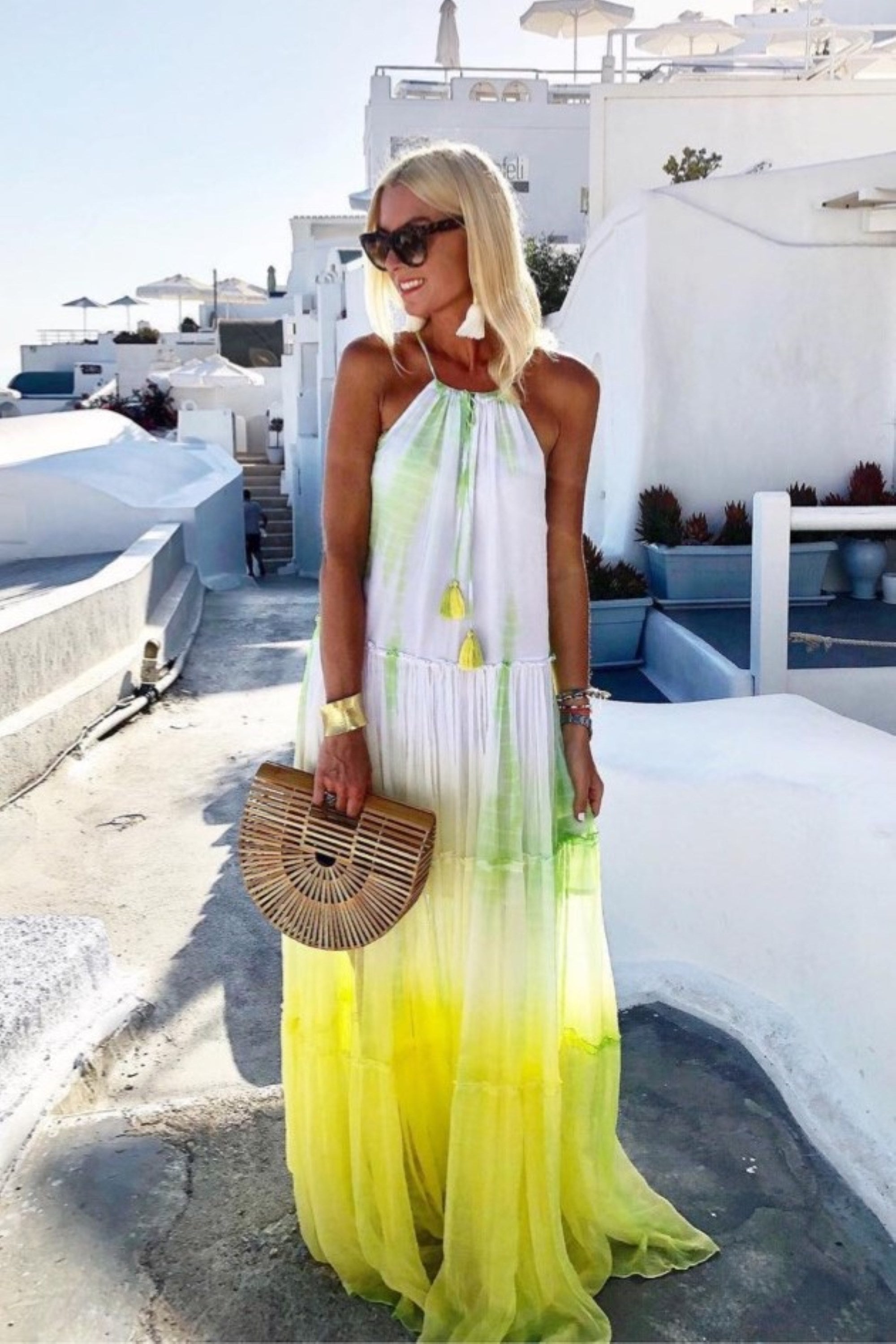 Yellow silk maxi dresses to wear on holiday in Santorini by Lindsey Brown resort wear