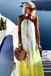 Yellow white silk resort wear dresses to wear in Santorini by Lindsey Brown luxury resort wear 